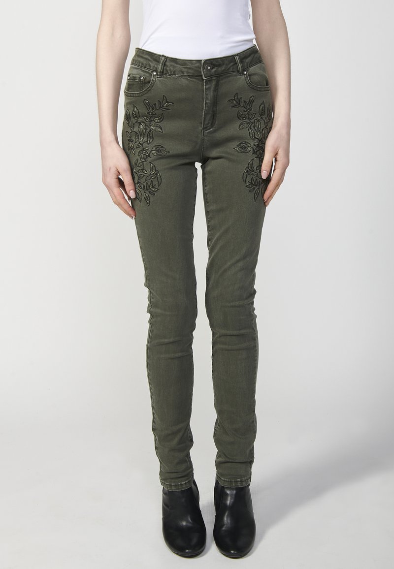Koroshi Karcsúsított farmerek - verde oscuro dark green