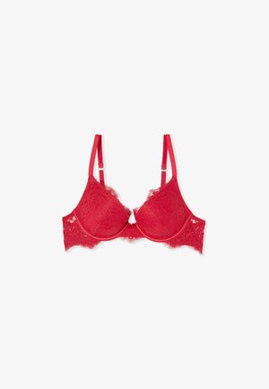 Soutien-gorge rouge en dentelle avec armatures, bretelles réglables et motifs floraux, conçu pour le soutien et un port décoratif.