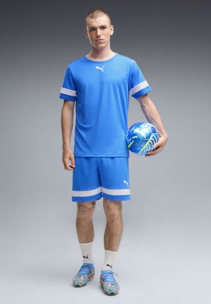 Puma, FUTURE 9 ULTIMATE ADVANCED LEVEL FG - Botines de fútbol para terreno firme - puma white-blue glimmer-pink glimmer-yellow alert