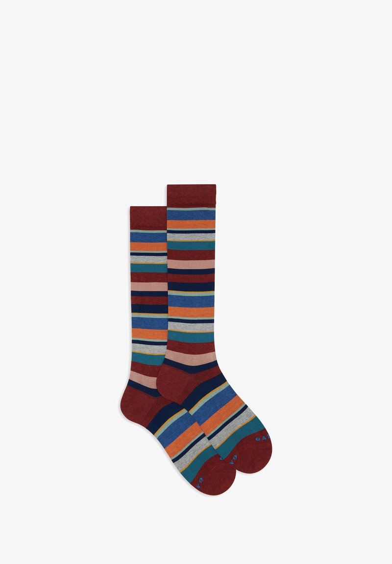 Calzini a righe con una combinazione di tonalità rosse, blu, verdi e beige. Realizzati in materiale morbido con un design comodo che arriva a metà polpaccio.