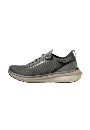 Gray athletic sneaker with knit upper, lace closure, cushioned beige sole, and pull tab at the heel shown from the side on white background.