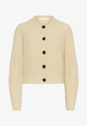 Cardigan tricotat scurt, de culoare crem, cu guler rotund, având șase butoane negre pe față și o țesătură texturată.