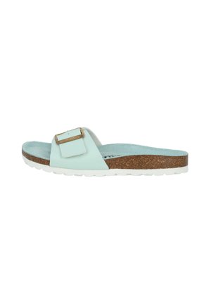 Light blue slide sandal with a wide strap, featuring a decorative buckle, soft suede footbed, and a cork midsole with a white rubber outsole.