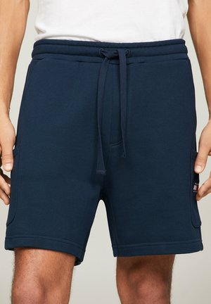 BADGE CARGO - Tracksuit bottoms - dark night navy