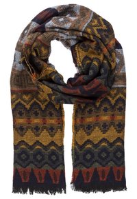 Écharpe tissée multicolore présentant des motifs géométriques en or, marine et rouge. Les bords sont frangés avec une finition en tissu texturé.