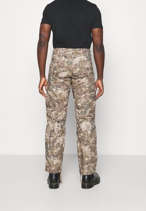 Reisitaskuhousut - light brown