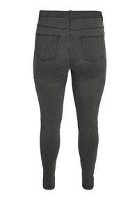 Jeans skinny de color gris oscuro con bolsillos traseros, pasadores para cinturón y una cintura alta, mostrados desde la parte posterior sobre un fondo blanco.