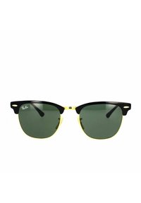 Occhiali da sole Ray-Ban con montatura nera e accenti gialli, lenti verdi, forma classica e cuscinetti nasali distintivi.