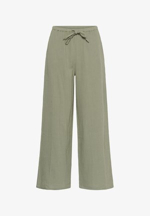Light olive green wide-leg pants with elastic waistband and tied drawstring, made of textured lightweight fabric.