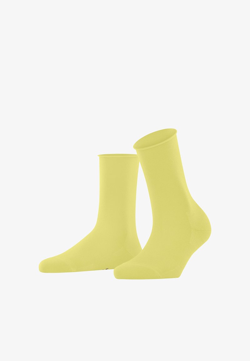 Yellow cotton socks with a smooth texture, ankle height, and ribbed cuffs. They feature a standard toe design and seamless construction.