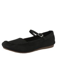 Scarpa piatta in suede nera con punta tonda, cuciture decorative e una fascia con una fibbia argentata sul collo del piede. Suola bassa marrone.
