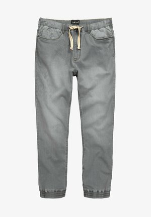 Pantaloni jogger grigi in denim con vita elastica, cintura regolabile con cordoncino e polsini a coste. Presentano due tasche frontali.