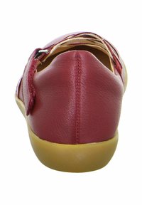 Red leather shoe with a smooth texture and rounded back, featuring yellow rubber sole and a slit design on the upper for ventilation.