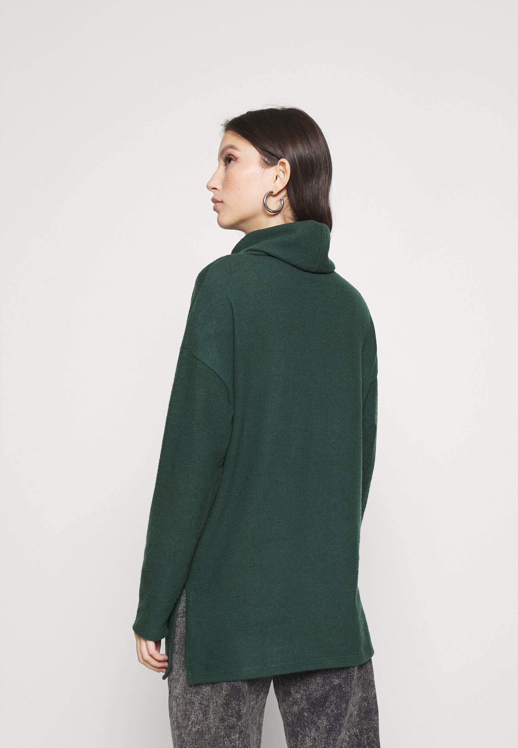 green longline jumper