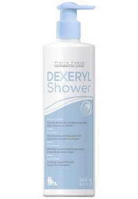 Dexeryl Duschcreme in einer 500 ml weißen Kunststoffpumpe. Mit blauen Akzenten und mehrsprachigem Text, der auf die Hydratation für sehr trockene Haut hinweist.