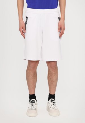 BERMUDA - Tracksuit bottoms - white