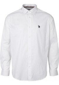 Camicia bianca a maniche lunghe con bottoni, realizzata in cotone, caratterizzata da un colletto classico e un piccolo logo scuro sul lato sinistro del petto.