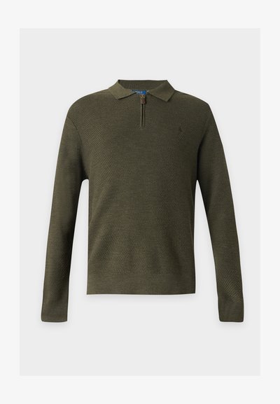 Pull en maille vert foncé à manches longues avec col et courte fermeture éclair devant.