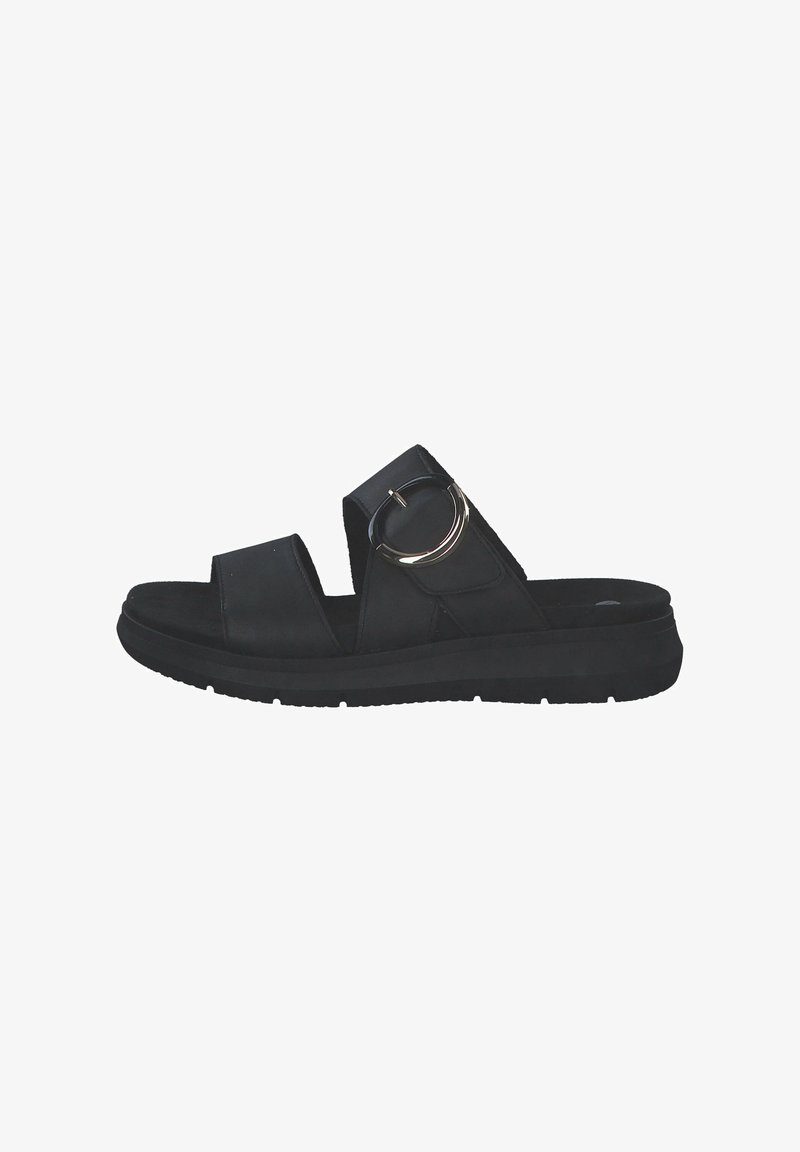 Chanclas negras con dos correas anchas, un acento metálico circular y una plantilla texturizada. La suela de goma proporciona estabilidad y comodidad.