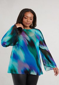 Flowy blouse in a blue, green, and purple abstract pattern. Features long, sheer bell sleeves and a round neckline. Lightweight fabric.