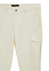 Pantaloni color crema con una texture liscia, dotati di una tasca cargo laterale e vestibilità su misura. Design semplice con dettagli hardware minimi.