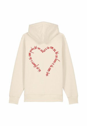 Cremefarbener Hoodie mit rotem Text in Herzform auf dem Rücken, aus weichem Baumwollmaterial und mit entspanntem Design.