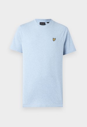 Svetlo modra bombažna majica s okroglim izrezom in kratkimi rokavi. Na prsih ima majhen, rumen vezen metuljček kot logotip.