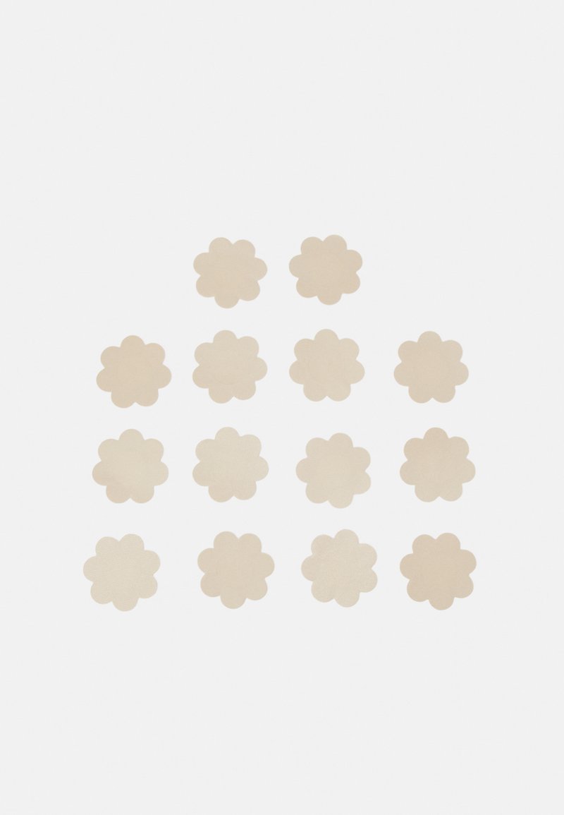 Samolepky v tvare kvetov usporiadané v mriežke; jemná béžová farba, matný povrch a zúbkované okraje. Spolu 16 kusov na bielom pozadí.