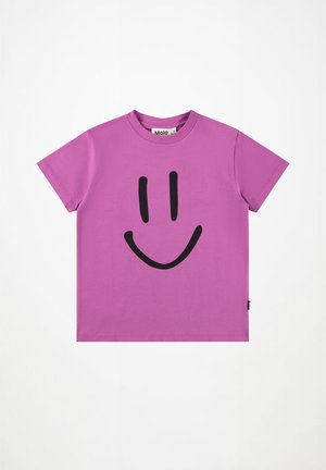 Rosa bomull t-skjorte med et stort svart smilefjes-design på forsiden. Korte ermer og rund hals. Merker på siden.