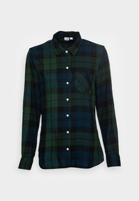 Langärmliges Flanellhemd im dunkelgrünen und schwarzen Karomuster. Mit einem klassischen Kragen, Knopfleiste und einer Brusttasche. Aus Baumwollmaterial.