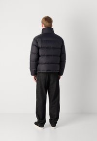 Calvin Klein PUFFER - Dunjakker - black