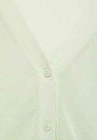 Ljusgrön kofta med V-ringning, mjuk stickad textur och två knappar framtill för st ängning.