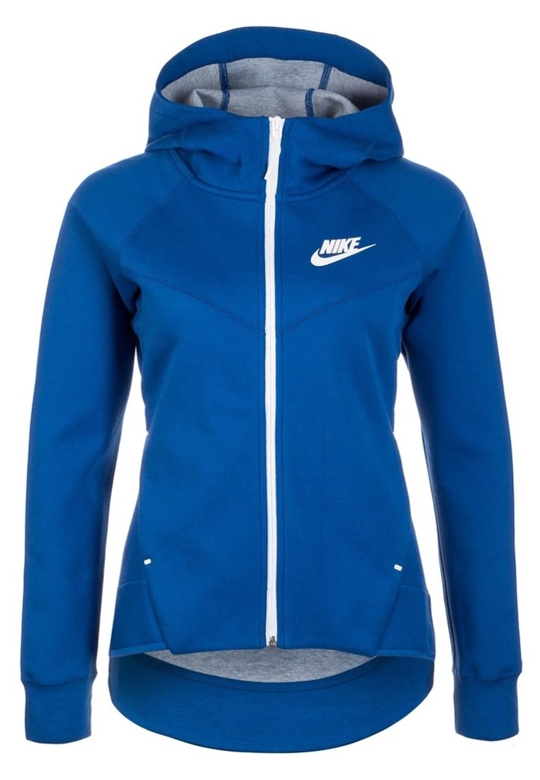 Blå Nike draghuva med huva, vit dragkedja och vit logotyp på bröstet, med en längre bakhem och sidofickor.