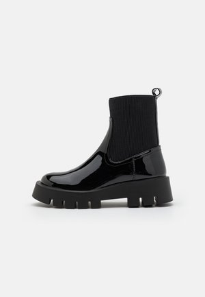 Platform ankle boots - black