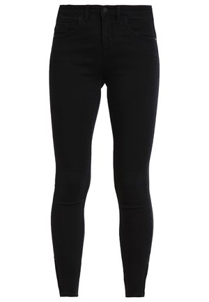 Zwarte denim skinny jeans met een medium taille, vijf zakken en standaard stiksels. Gladde textuur met minimale vervaging, klassiek ontwerp.