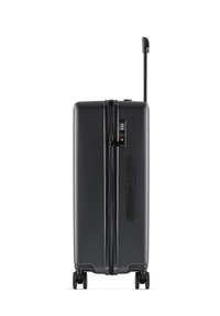 Black hard-shell suitcase with a retractable handle, four wheels, dual zipper closure, and combination lock on the side.
