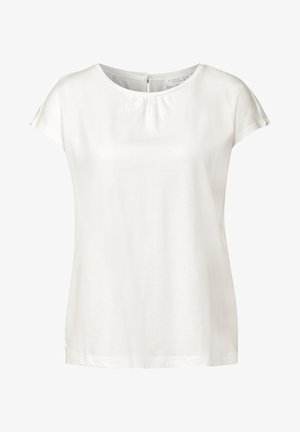 Biała bluzka z krótkim rękawem, okrągłym dekoltem, delikatnym marszczeniem z przodu i małym zapięciem z tyłu. Wykonana z miękkiej bawełny, luźny krój.