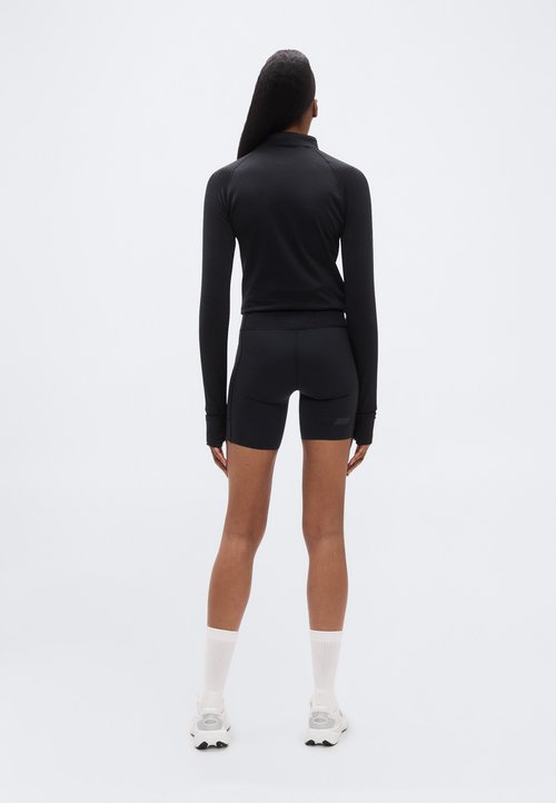New Balance SLEEK STORAGE RACE SHORT - Short running tights - black — photo 3