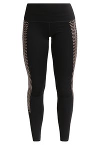 Leggings neri con vita alta e un motivo a rete geometrico di colore chiaro lungo il lato esterno. Tessuto elasticizzato, texture liscia.