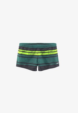 Shorts de bain verts et noirs avec des rayures horizontales en jaune vif et gris foncé. Ils ont une texture lisse et un design ajusté.