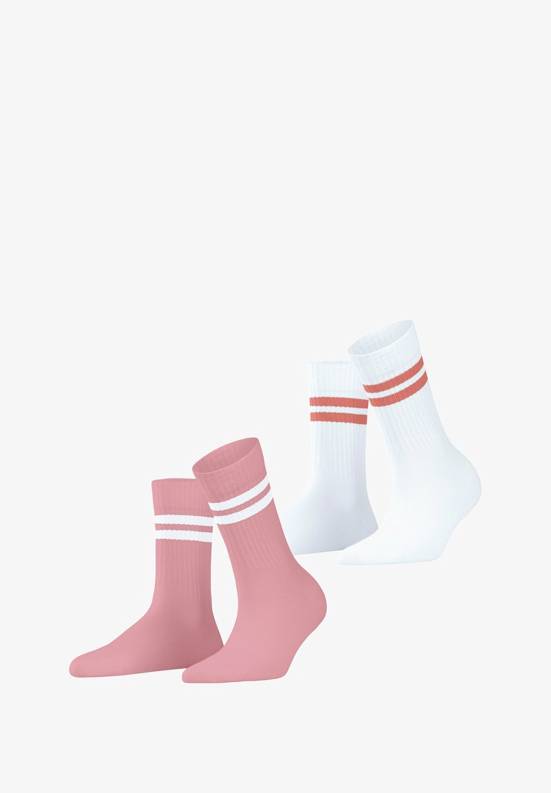 Rosa und weiße Socken. Ein Paar ist einfarbig rosa mit weißen Streifen oben; ein anderes Paar ist einfarbig weiß mit roten und weißen Streifen oben.