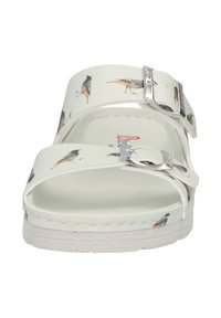 White sandals with bird patterns, featuring a double strap design, silver buckle detail, and a textured sole for grip.