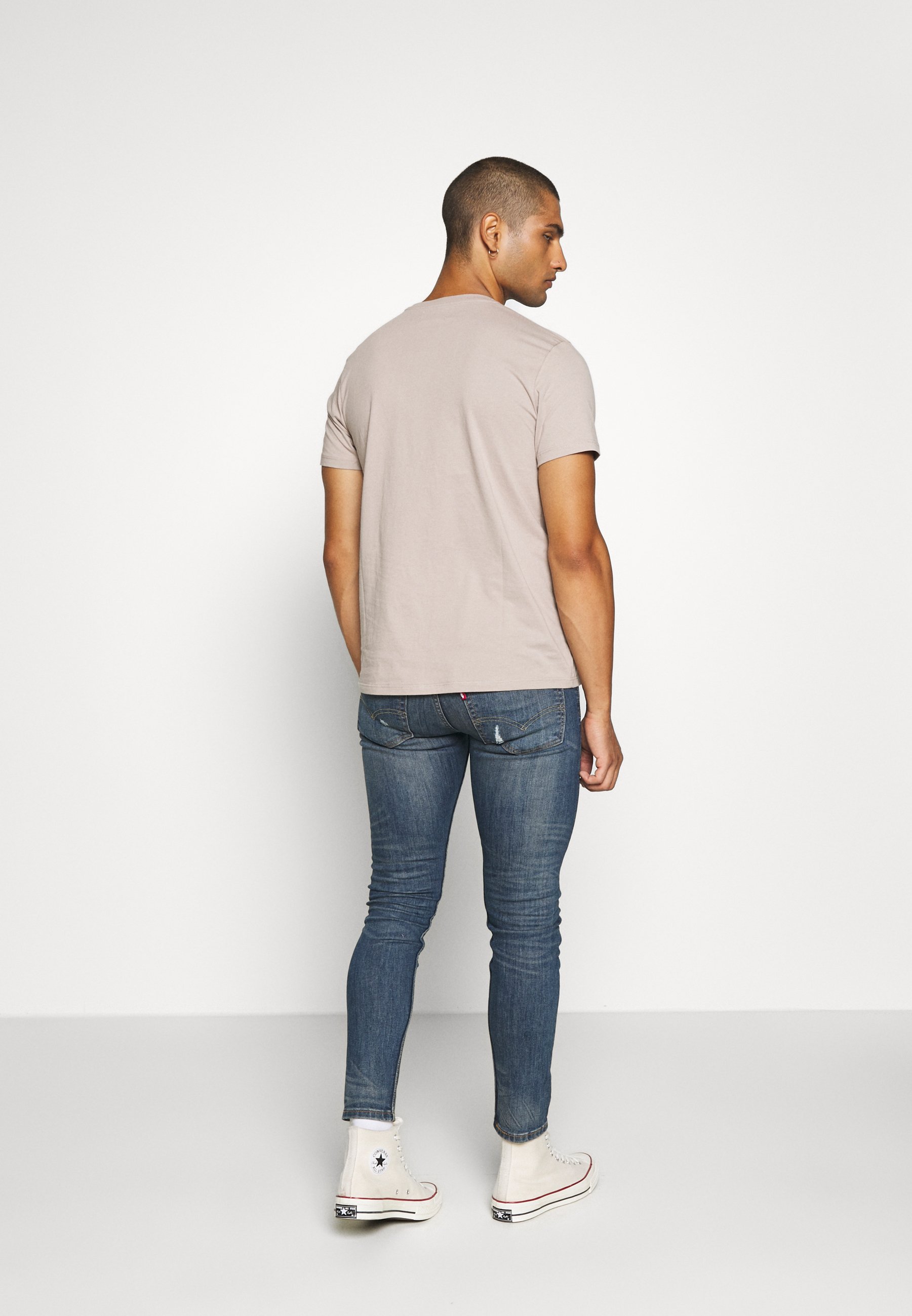 Levi's® 519™ EXT SKINNY HI-BALLB - Aptempti džinsai - tide ride/mėlynų  džinsų - Zalando.lt
