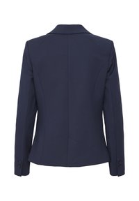 Námořnický upravený blazer s hladkou texturou, klopovým límcem a manžetami na dva knoflíky. Detaily zadního švu poskytují strukturovanou siluetu.