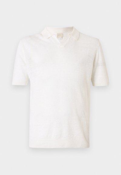 Πόλο μπλούζα με κοντά μανίκια σε κρεμ χρώμα, με V-λαιμόκοψη, λεία υφή, ριμπ τελειώματα στα μανίκια και μινιμαλιστικό σχέδιο χωρίς  σχέδια.