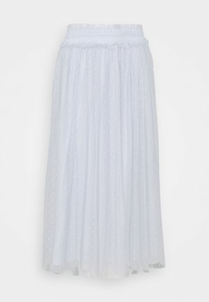 White maxi skirt with smocked waistband and sheer layered fabric featuring small embroidered cross patterns.