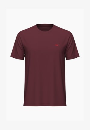 Camiseta burdeos de algodón, con mangas cortas y cuello redondo. Incluye un pequeño logo rojo de Levi's en el pecho.