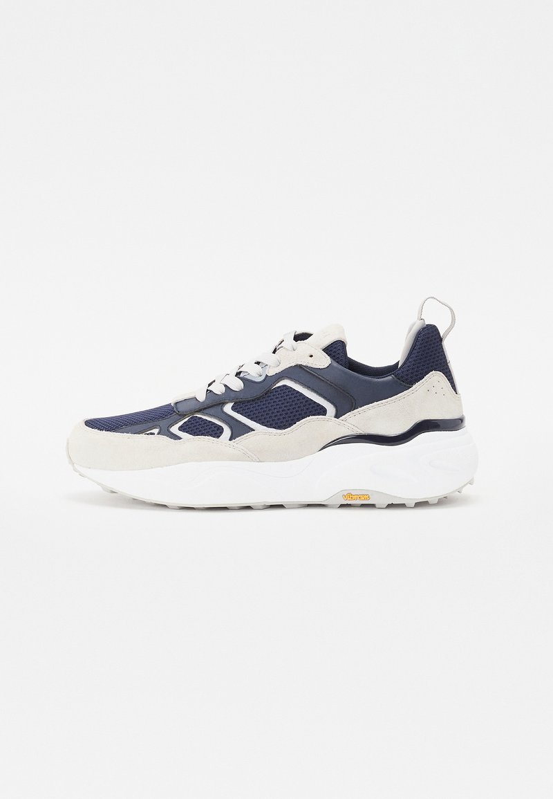 Navy mesh and gray suede sneaker with white outsole, featuring accent details and a textured finish. Vibram logo on the sole.