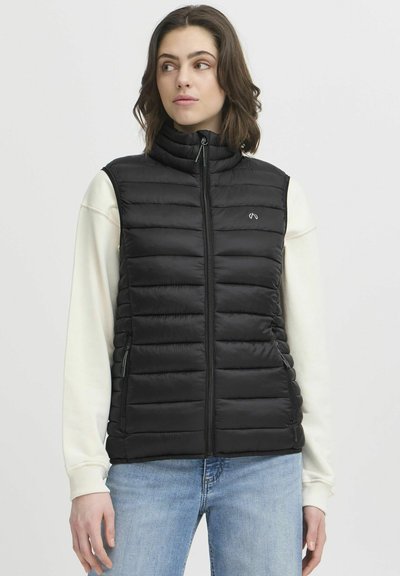 Breipatroon Wijd damesvest met knoopsluiting Breipatroon Wijd damesvest met knoopsluiting