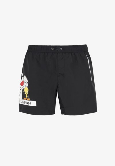 Costume da bagno neri realizzati in tessuto leggero, con una grafica di Sylvester e Tweety sul lato sinistro e una tasca con zip sul lato destro.